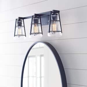 Adelaide 24 in. 3-Light Matte Black Craftsman Transitional Bathroom Vanity Light with Clear Seeded Glass Shades
