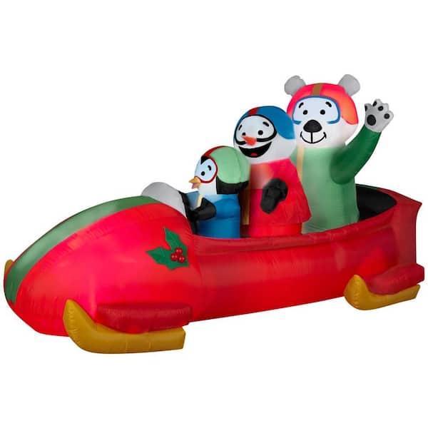 Gemmy 83.86 in. W x 37.01 in. D x 42.91 in. H Animated Inflatable Bobsled Team Penguin Snowman and Teddy Bear