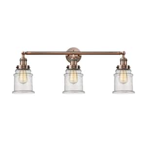 Canton 30 in. 3 Light Antique Copper Vanity Light with Seedy Glass Shade