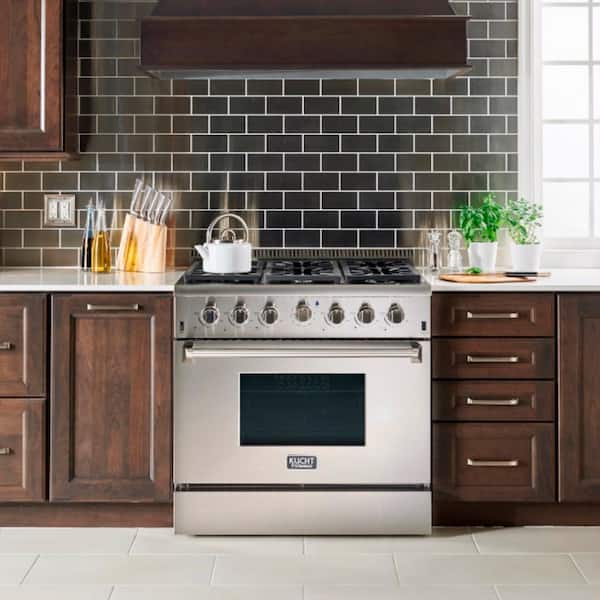 https://images.thdstatic.com/productImages/e5d09aac-fcb1-41d9-9627-f678bf554f3a/svn/stainless-steel-kucht-single-oven-gas-ranges-kn3624uc-31_600.jpg