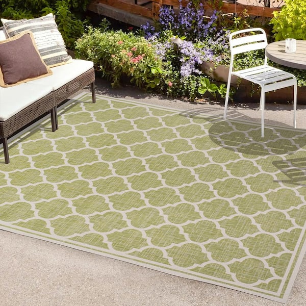 https://images.thdstatic.com/productImages/e5d3bdd6-6c0d-4a29-aeaa-7391baad3683/svn/green-cream-jonathan-y-outdoor-rugs-smb109g-4-64_600.jpg