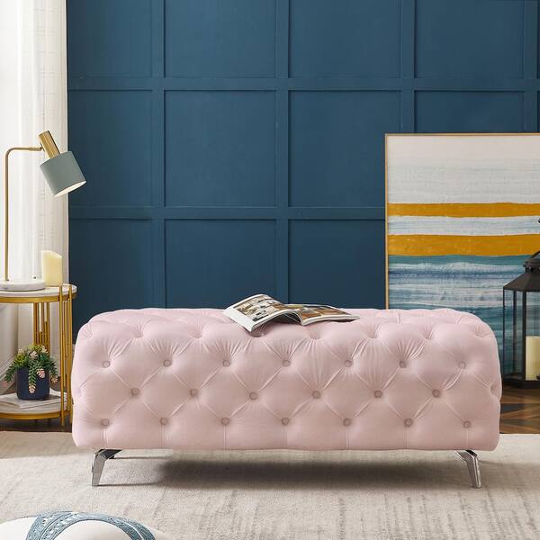 pink tufted bench