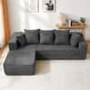 Grey L-shaped sectional sofa bed in a living room.