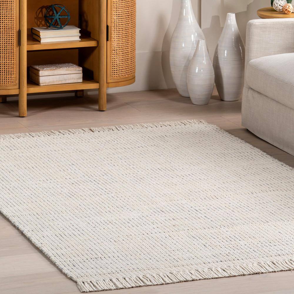 Handmade Ivory Wool Rectangular Area Rug with Fringe
