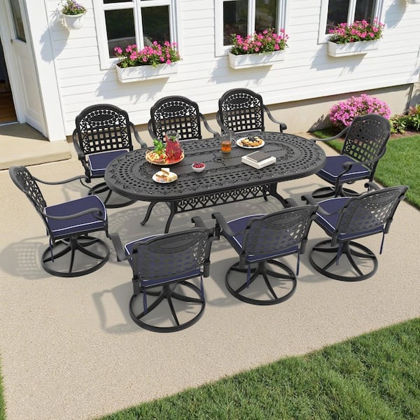 Vintage 9-Piece Cast Aluminum Patio Outdoor Dining Set with Oval Dining Table, 8 Swivel Chairs and 8 Blue Cushions