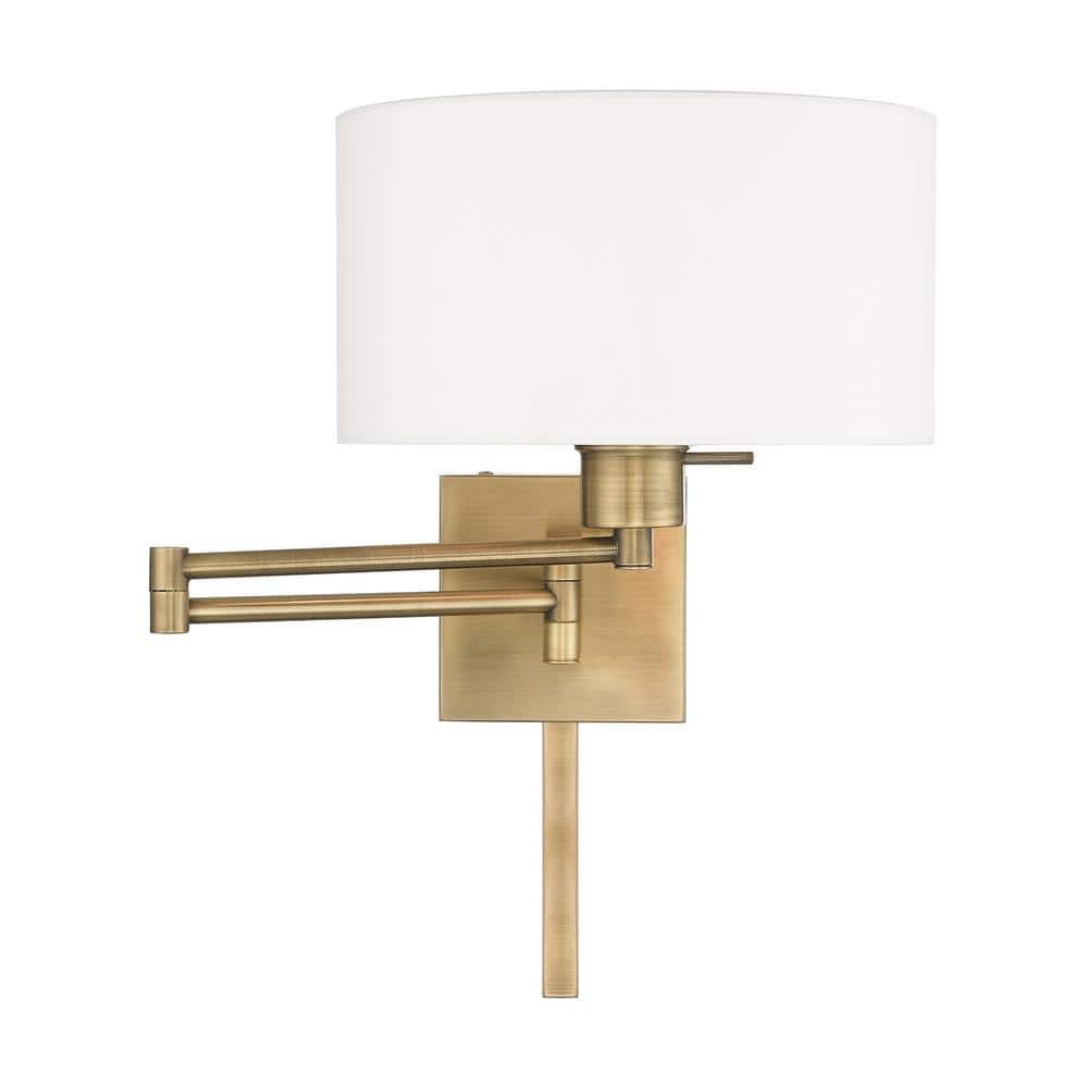 Antique Brass Swing Arm Wall Lamp with Off-White Fabric Shade