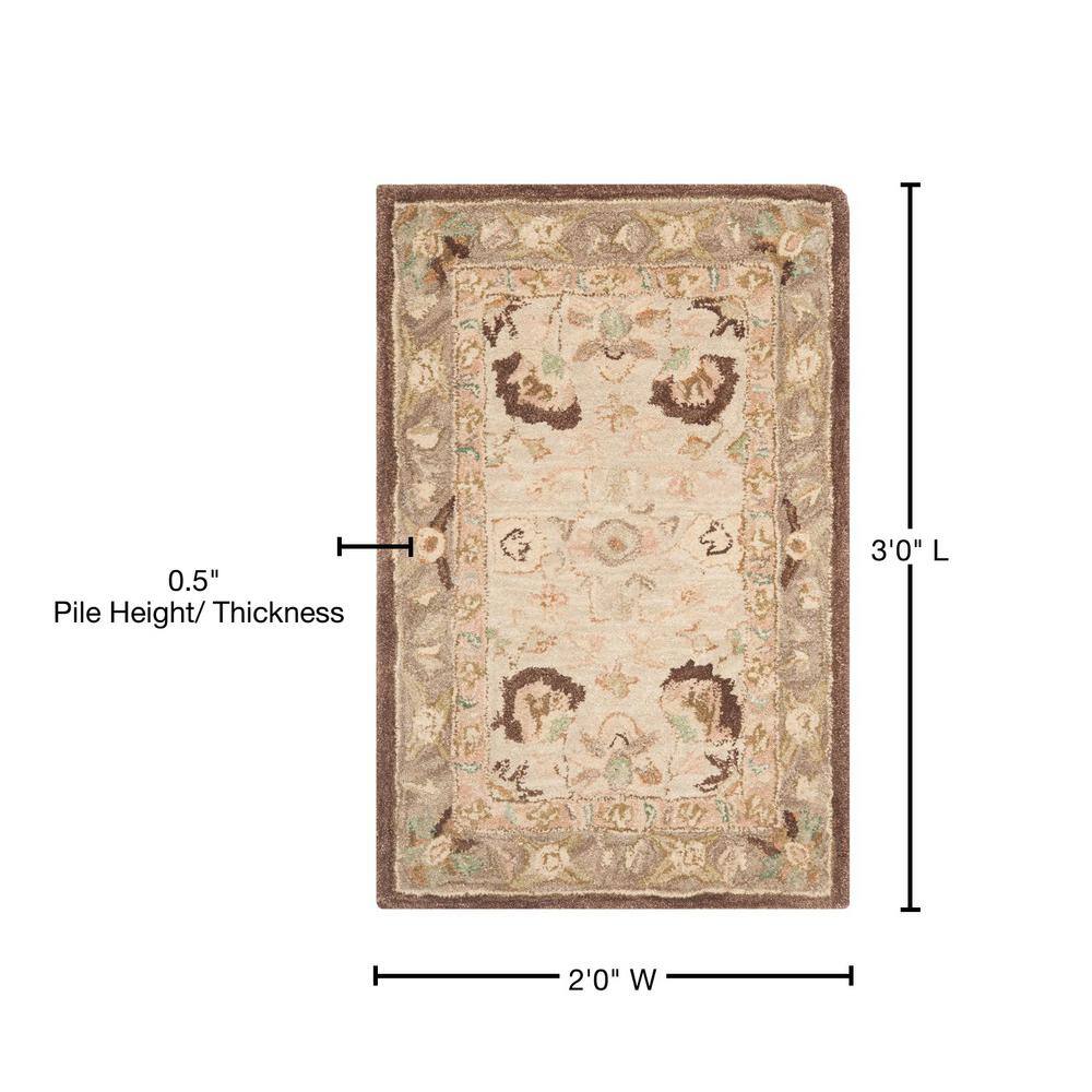 Handmade Anatolia Ivory & Brown Tufted Wool Accent Rug - 2' x 3'