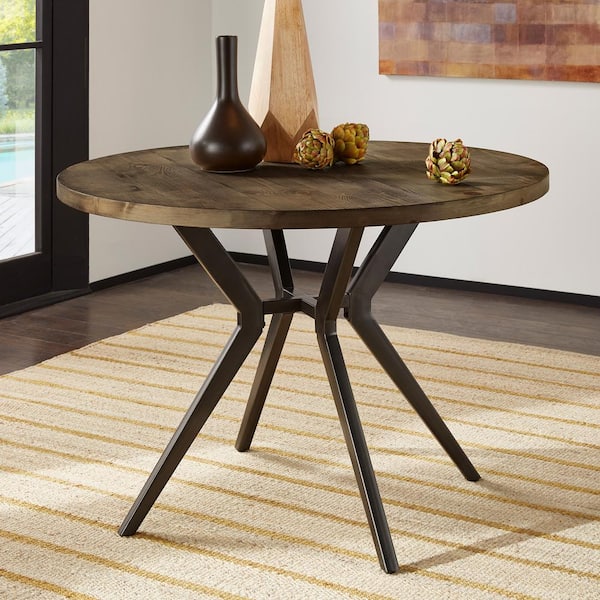 HomeSullivan Driftwood Grey Finish and Iron Grey Metal Base Cross Legs Round Dining Table Seats 4