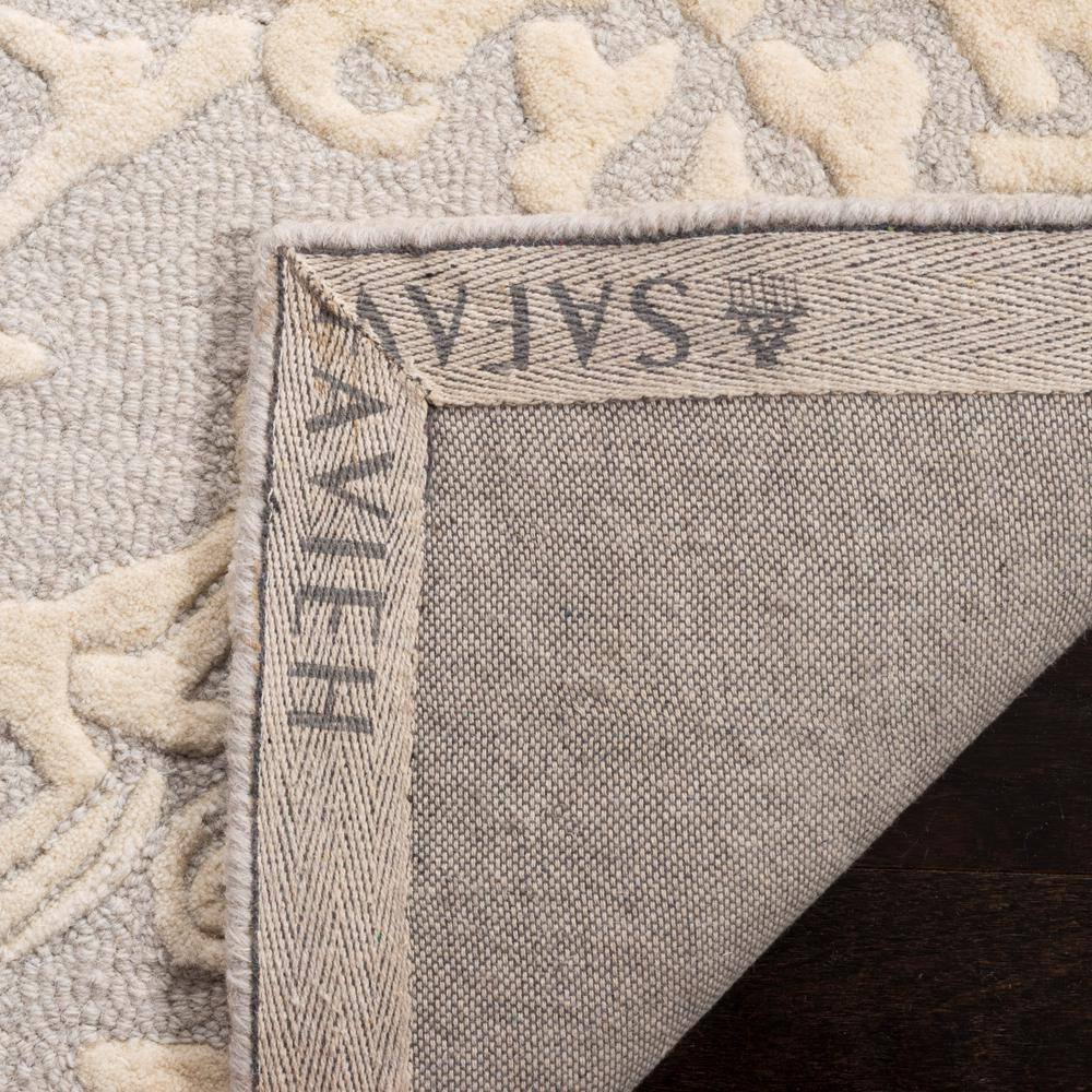 Light Grey and Ivory Floral Wool Tufted Area Rug 5' x 8'