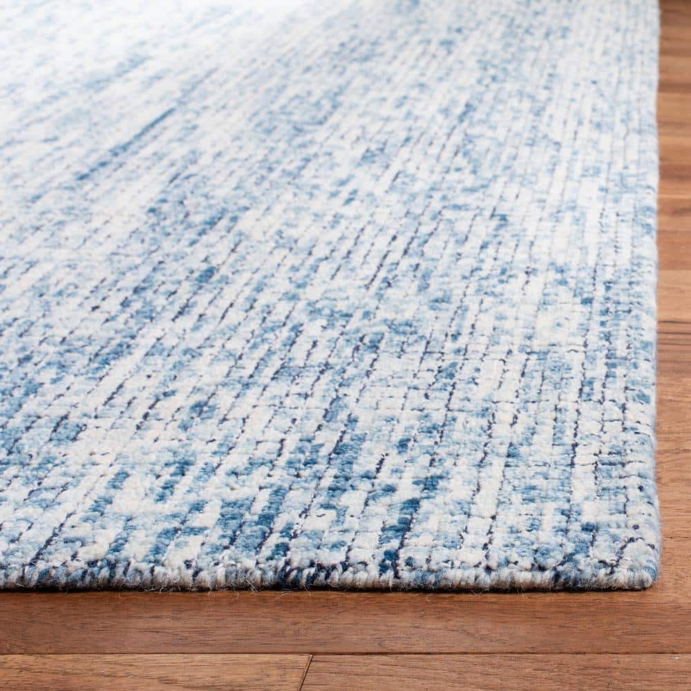 Ivory and Navy Abstract Wool Handmade Area Rug