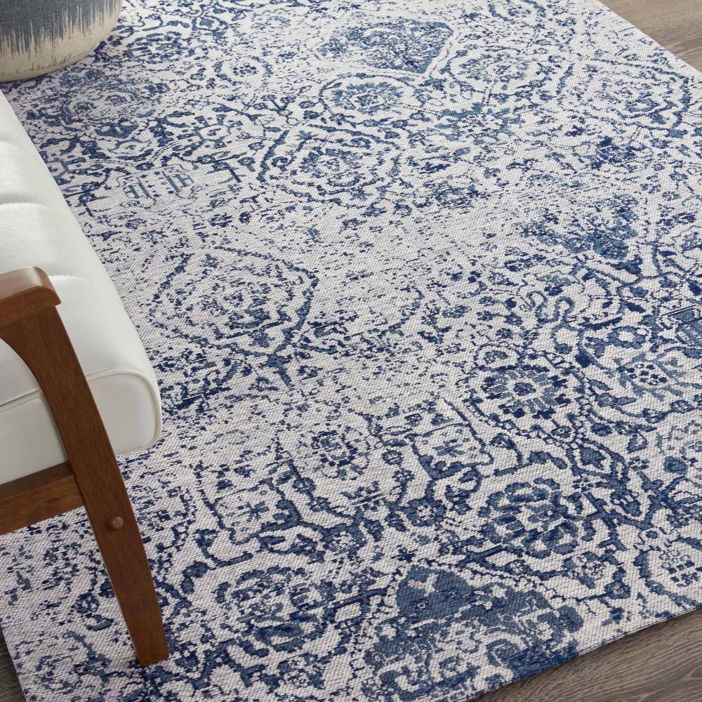 Ivory and Navy Medallion Synthetic 4' x 6' Area Rug