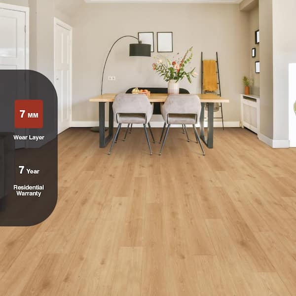 TrafficMaster Rockwood Oak 7 mm T x 7.64 in. W Laminate Wood