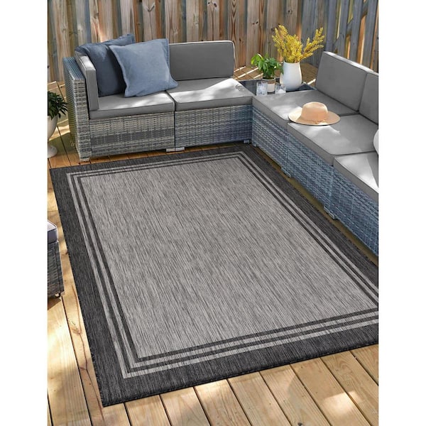 https://images.thdstatic.com/productImages/e63dfe1c-2523-4831-a215-e75ee70bd6d5/svn/silver-pebble-outdoor-rugs-hd-alh60262-6x9-c3_600.jpg