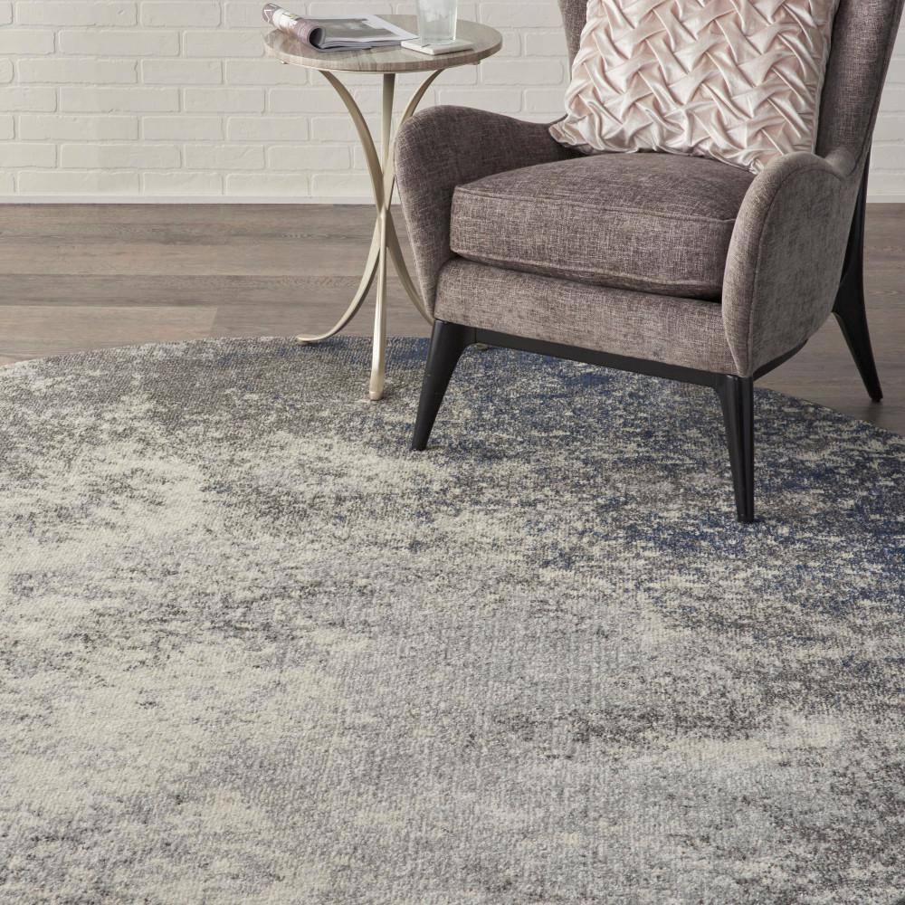 Large Round Gray and Ivory Synthetic Traditional Rug