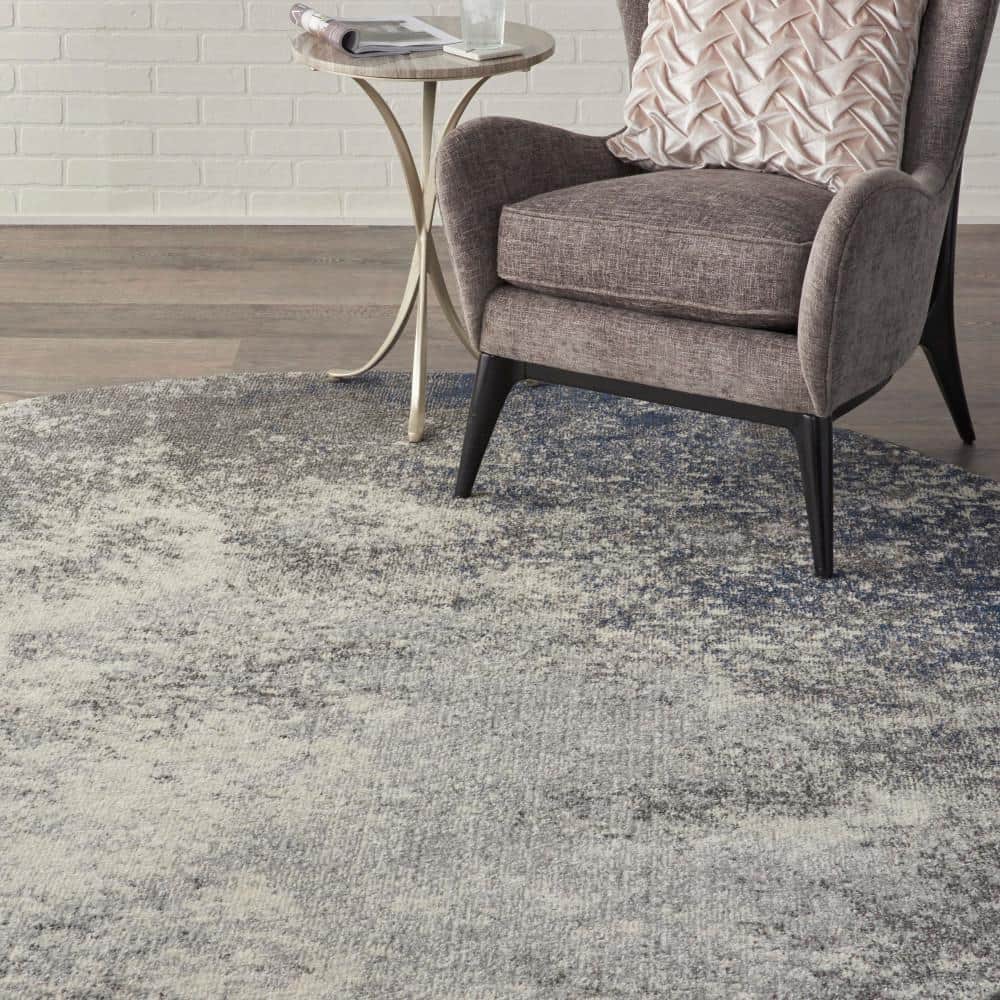 Large Round Gray and Ivory Synthetic Traditional Rug