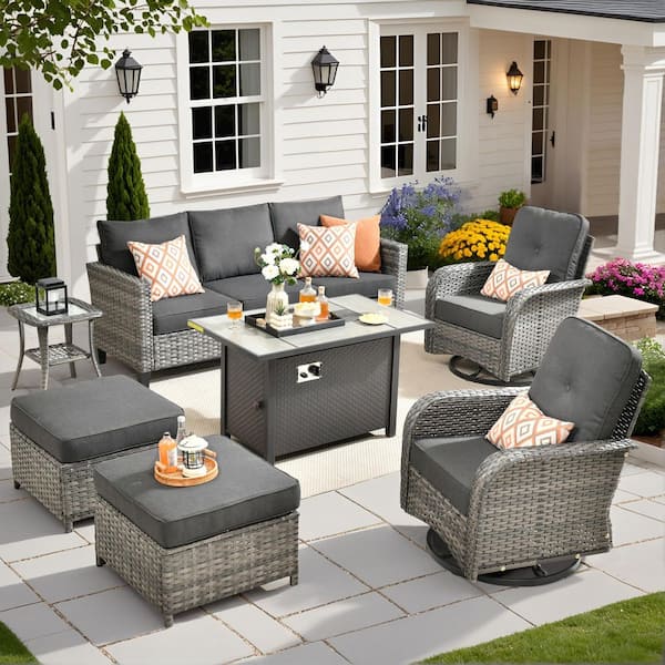 XIZZI Elvira 7-Piece Wicker Patio Rectangular Fire Pit Set with Black Cushions and Swivel Rocking Chairs