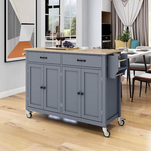 54 in. Gray Solid Wood Top Kitchen Cart Island with 4-Door Cabinet, Drawers, Spice Rack, Towel Rack, and Wheels