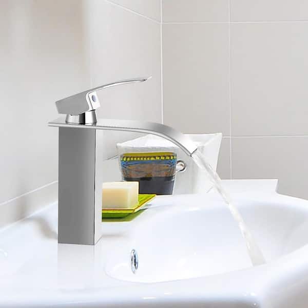 Waterfall Single Hole Single-Handle Low-Arc Bathroom Faucet With Pop-up Drain Assembly in Polished Chrome