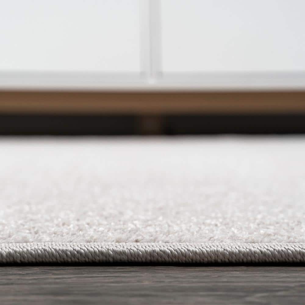 Ivory Soft Synthetic 5' Square Easy-Care Area Rug