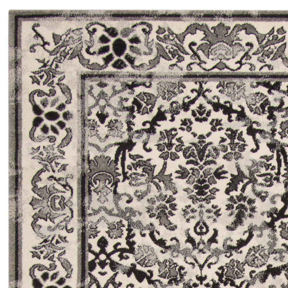 Ivory and Gray Floral Synthetic Reversible Area Rug, 9' x 12'