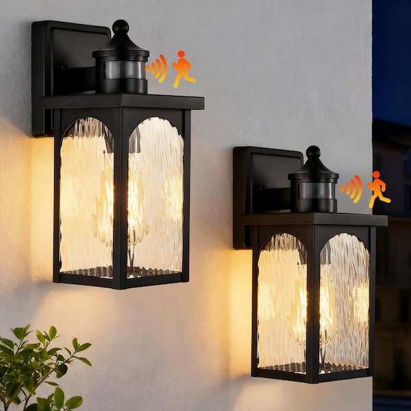 12 in. 1-Light Black Motion Sensing Dusk to Dawn Outdoor Hardwired Wall Lantern Sconce w/ Water Wave Clear Glass 2-Pack
