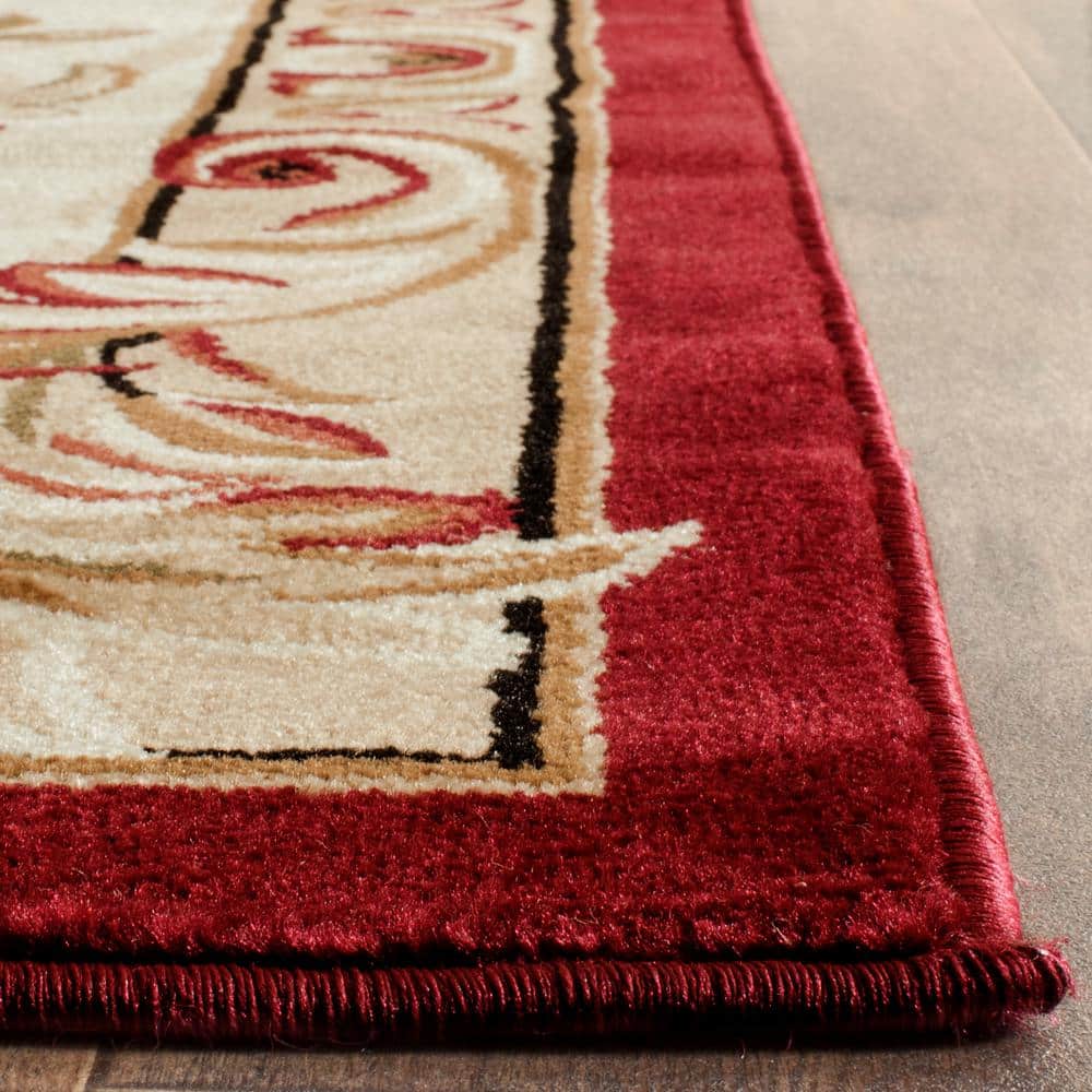 Red and Ivory Rectangular Tufted Synthetic Area Rug 6' x 9'