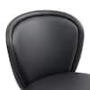 Close-up of black faux leather seat of a dining chair.