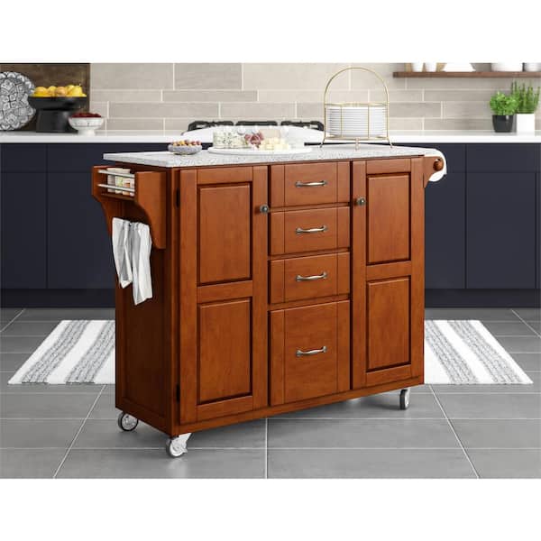 https://images.thdstatic.com/productImages/e69d6f8f-9606-42e9-be2f-6c7f3d1b9bca/svn/cherry-with-salt-and-pepper-granite-top-homestyles-kitchen-carts-9100-1073-76_600.jpg