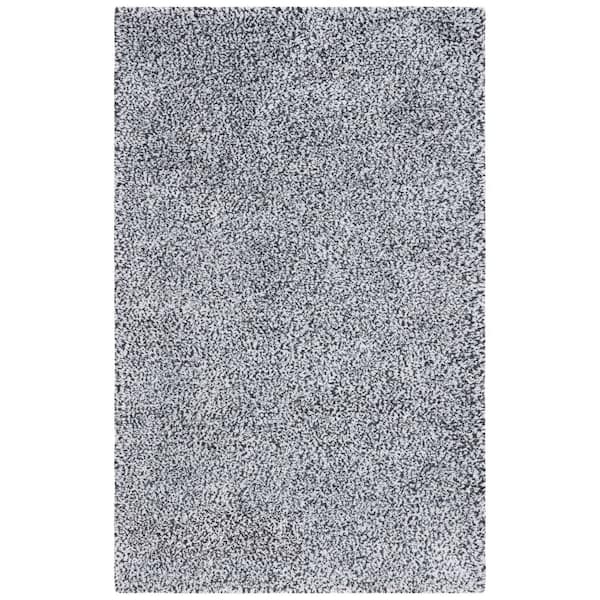 Berber 6 ft. x 9 ft. Ivory/Black Abstract Speckled Area Rug