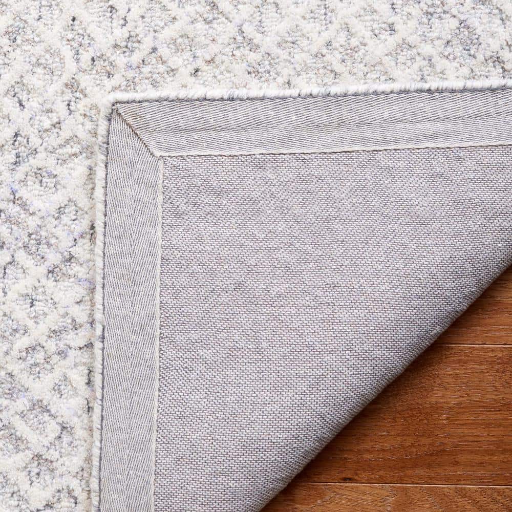 Ebony Black and Ivory Hand Tufted Wool Area Rug