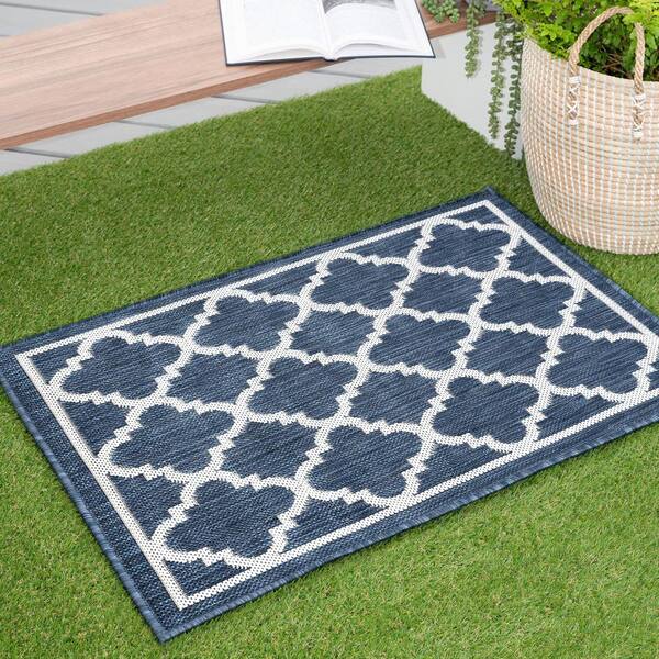 https://images.thdstatic.com/productImages/e6bccabc-759a-56f6-b79c-41bed850da2e/svn/navy-tayse-rugs-outdoor-rugs-eco1305-2x3-31_600.jpg