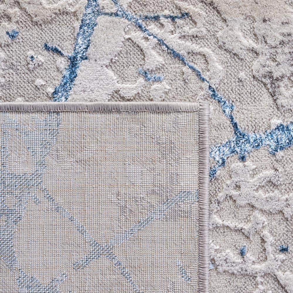 Grey and Blue Abstract Synthetic 9' x 12' Area Rug