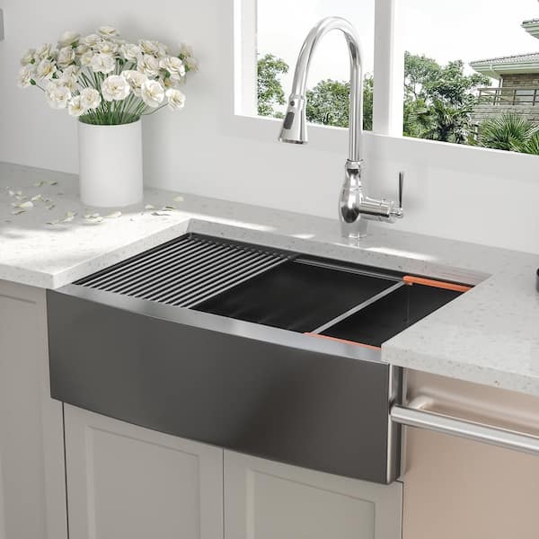 https://images.thdstatic.com/productImages/e6e8e839-7311-426d-a6f5-1309c51f6474/svn/gunmetal-black-drop-in-kitchen-sinks-w-sun-27-76_600.jpg