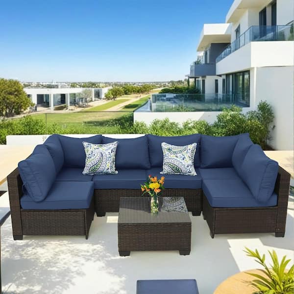 Cesicia Brown 7-Piece Wicker Outdoor Sectional Set with Glass Table and Dark Blue Cushions