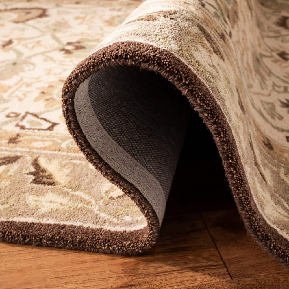 Ivory and Brown 8' x 10' Handmade Wool Floral Rug