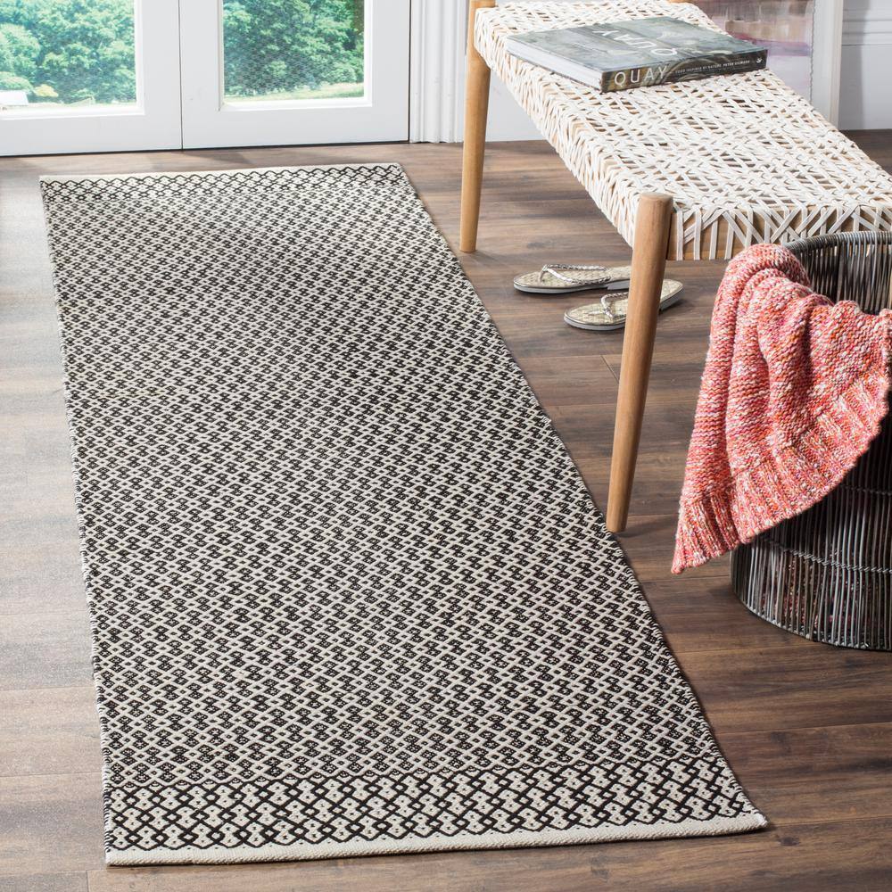 Coastal Charm Ivory & Black Handwoven Cotton Rug - 27" x 16"