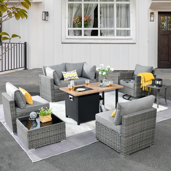 weaxty W Daffodil Y Gray 8-Piece Wicker Patio Storage Fire Pit Conversation Set with Swivel Rocking Chair and Dark Gray Cushions