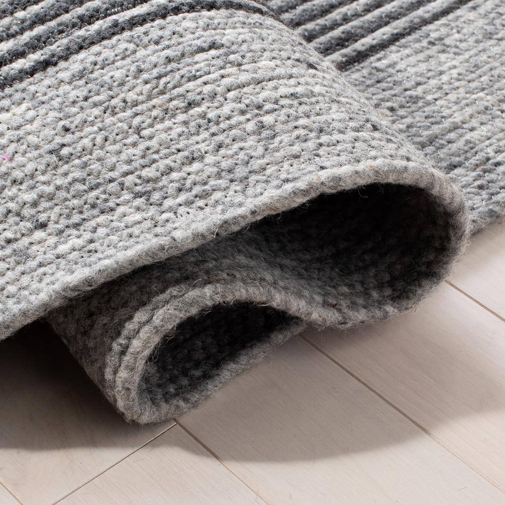 Gray and Black Oval Braided Wool Area Rug 6' x 9'