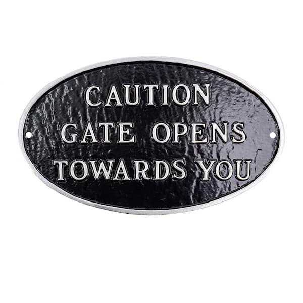 6 in. x 10 in. Small Oval Caution Gate Opens Towards You Statement Plaque Sign - Black/Silver