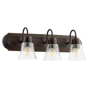 Campbell Traditional 24 in. Width, 3-Light Oiled Bronze Vanity Lights with Clear Seeded Glass shade