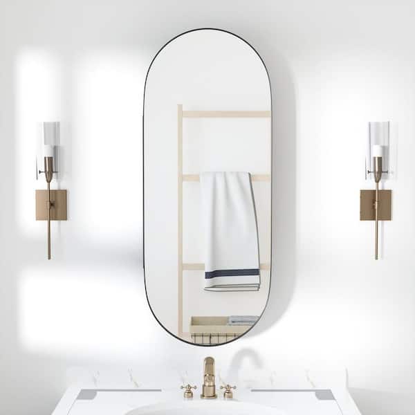 H 16 in. W x 32 in. H Oval Shape Recessed or Surface Mount Medicine Cabinet with Mirror in Black