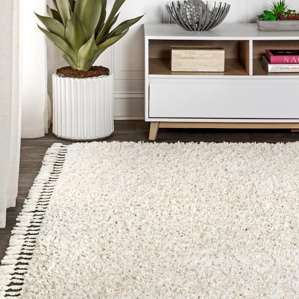 JONATHAN Y Mercer Shag Plush Tassel Cream 8 ft. x 10 ft. Area Rug