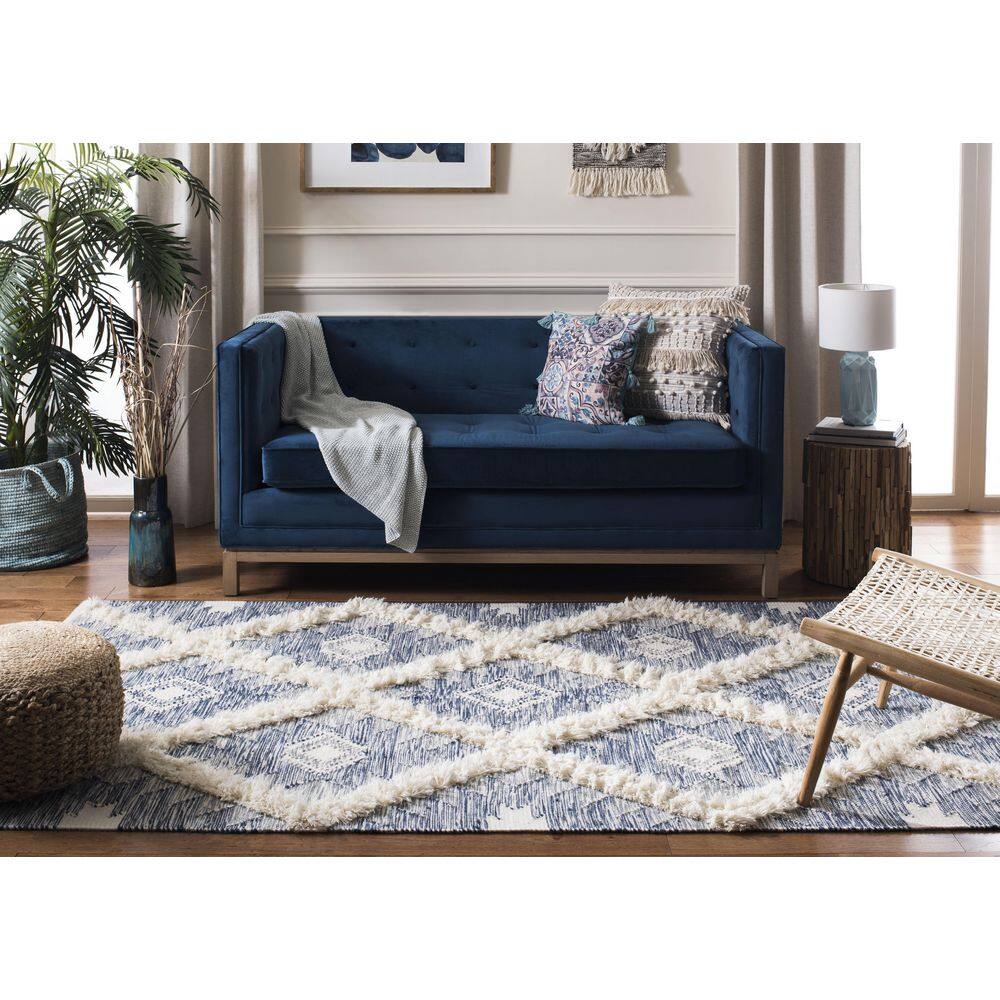 Ivory and Blue Hand-Knotted Wool 6' x 9' Area Rug