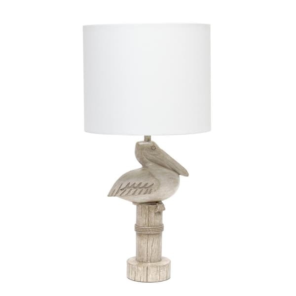 Simple Designs 17.25 in. Coastal Sitting Pelican Beige Wash Polyresin Bedside Table Desk Lamp with White Fabric Drum Shade