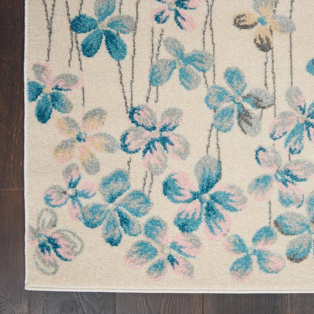 Ivory Floral Bliss Synthetic 5'3" x 7'3" Round Area Rug