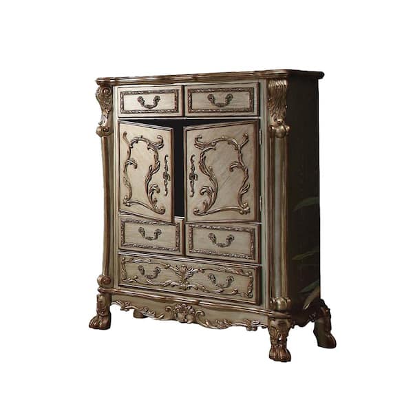 https://images.thdstatic.com/productImages/e7ba2f6f-93a3-4580-acf0-f94194416ec1/svn/gold-patina-and-bone-acme-furniture-chest-of-drawers-23166-77_600.jpg