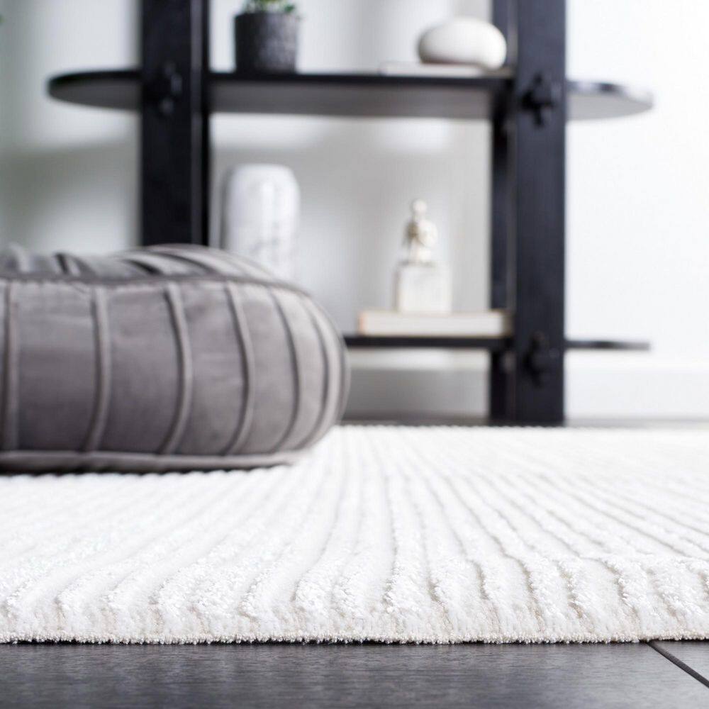 Ivory Hand-Knotted Synthetic Area Rug, 5'3" x 7'6"