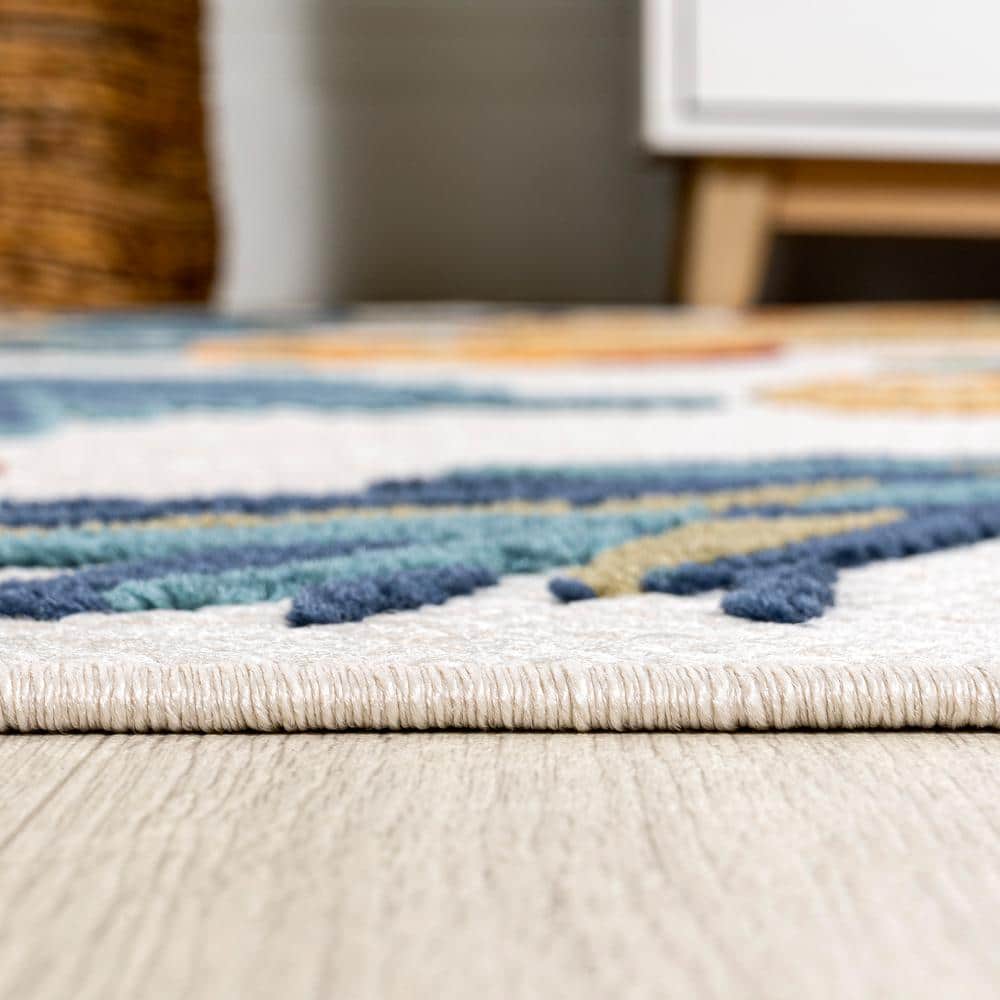 4' x 6' Ivory and Orange Floral Synthetic Area Rug