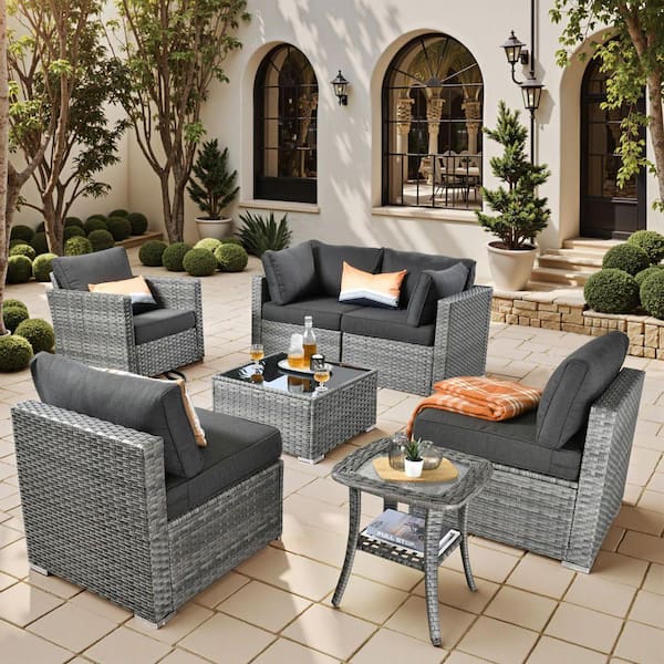 Sanibel Gray 7-Piece Wicker Patio Conversation Sofa Sectional Set with a Swivel Chair and Black Cushions