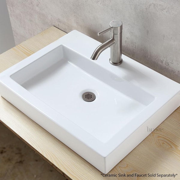 https://images.thdstatic.com/productImages/e80dc529-2d85-469a-a6d4-3d7f8218f624/svn/brushed-nickel-luxier-drains-drain-parts-ds05-tb-31_600.jpg